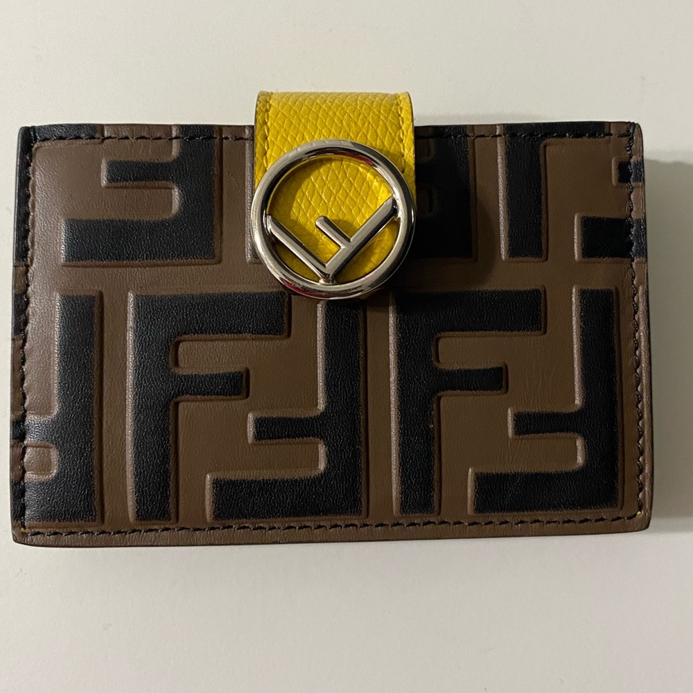 Authentic CARD HOLDER Yellow leather gusseted card
holder